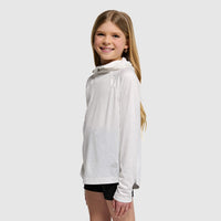 Young girl wearing light gray hooded sweatshirt with drawstrings, side view pose