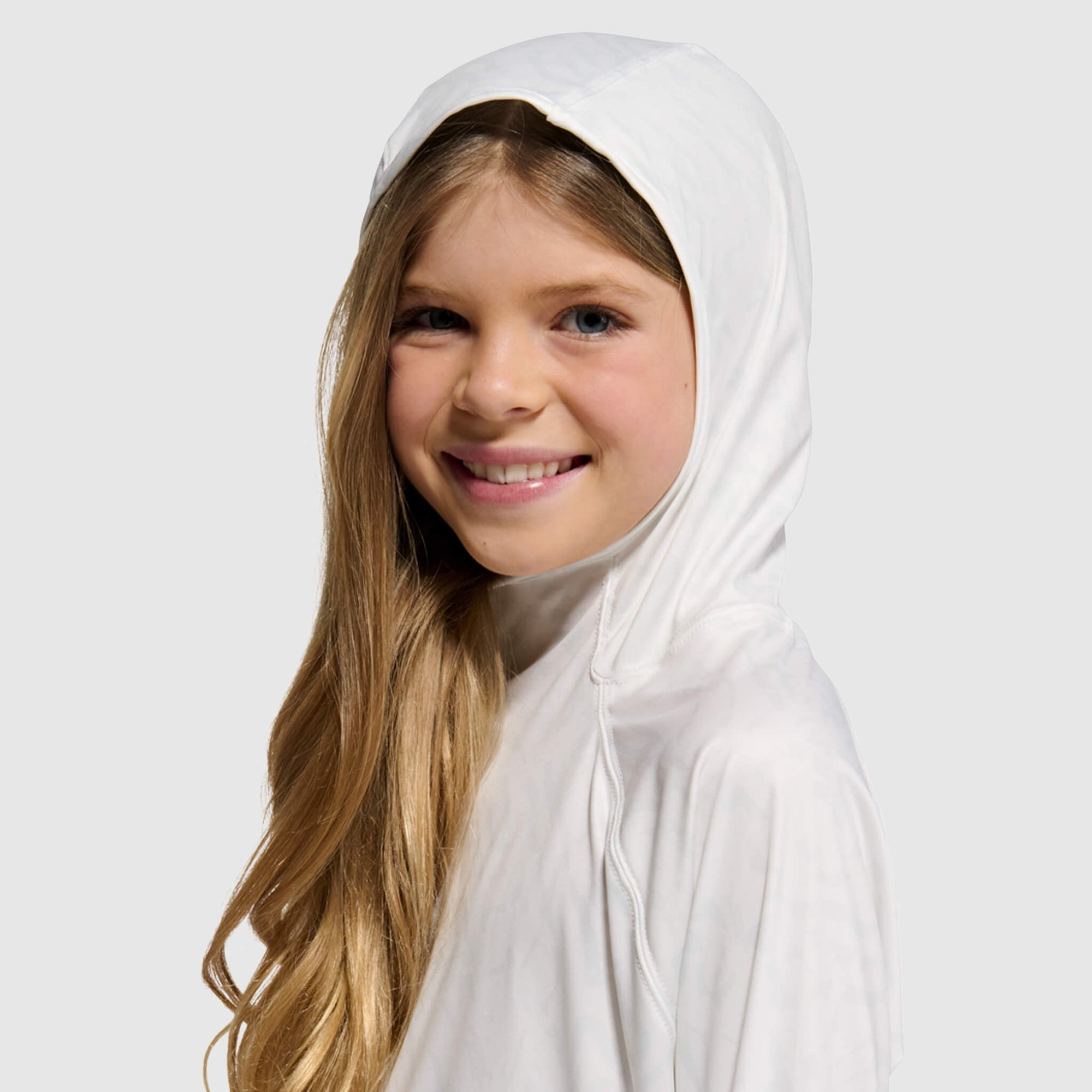 White hoodie with hood up on young person, studio portrait style