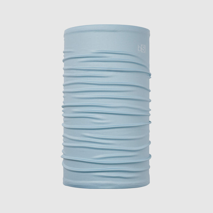 Light blue tubular neck gaiter with horizontal gathered fabric texture on clean background