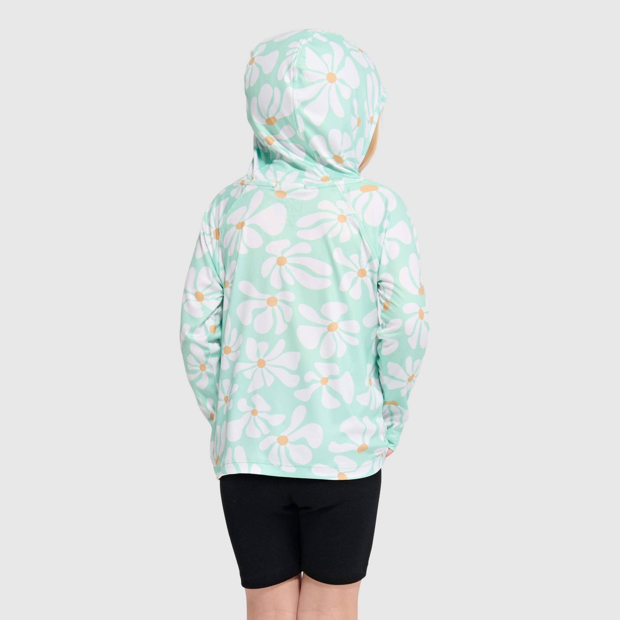 Light green hoodie with white daisy pattern shown from back view with hood up