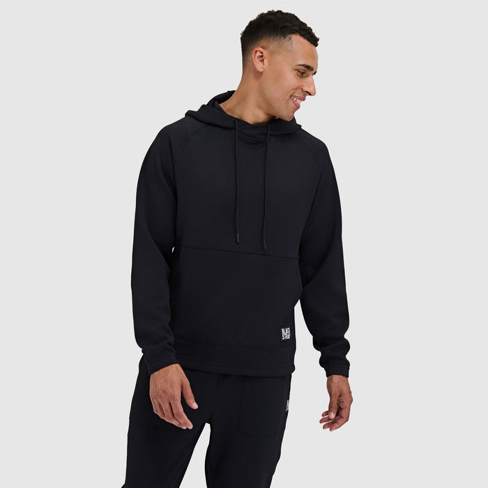 Black pullover hoodie with drawstrings and front pocket on male model