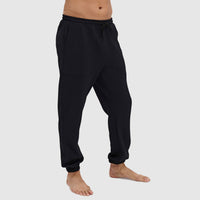 Black athletic jogger pants with drawstring waist and elastic cuffs worn by model