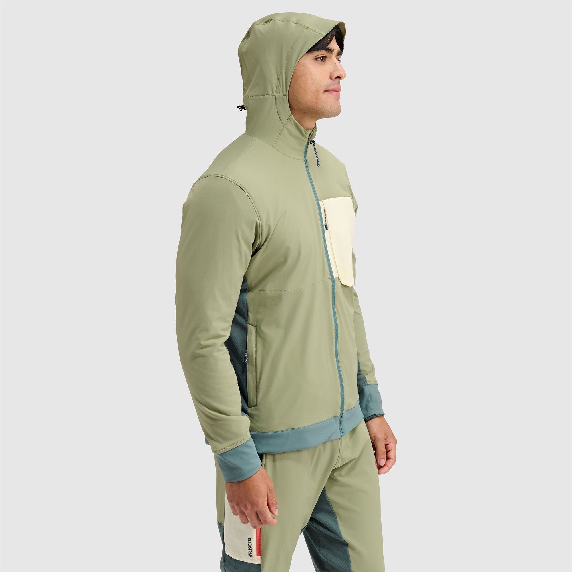 Men's hooded fleece jacket with full zip, color-blocked panels, side profile view