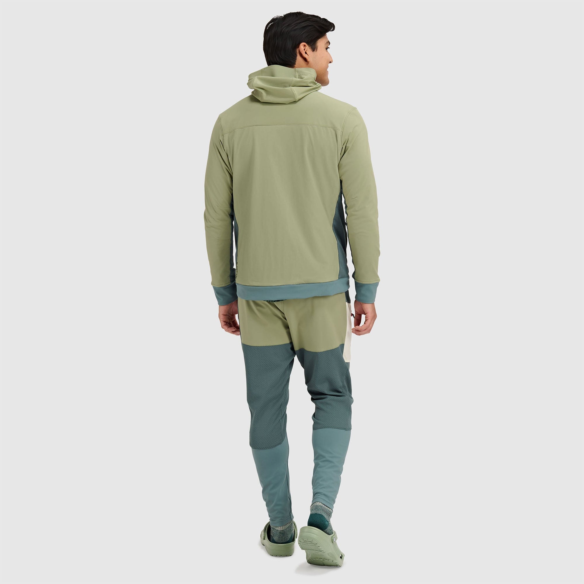 Men's fleece jacket with hood and matching pants in sage green with teal accents, back view