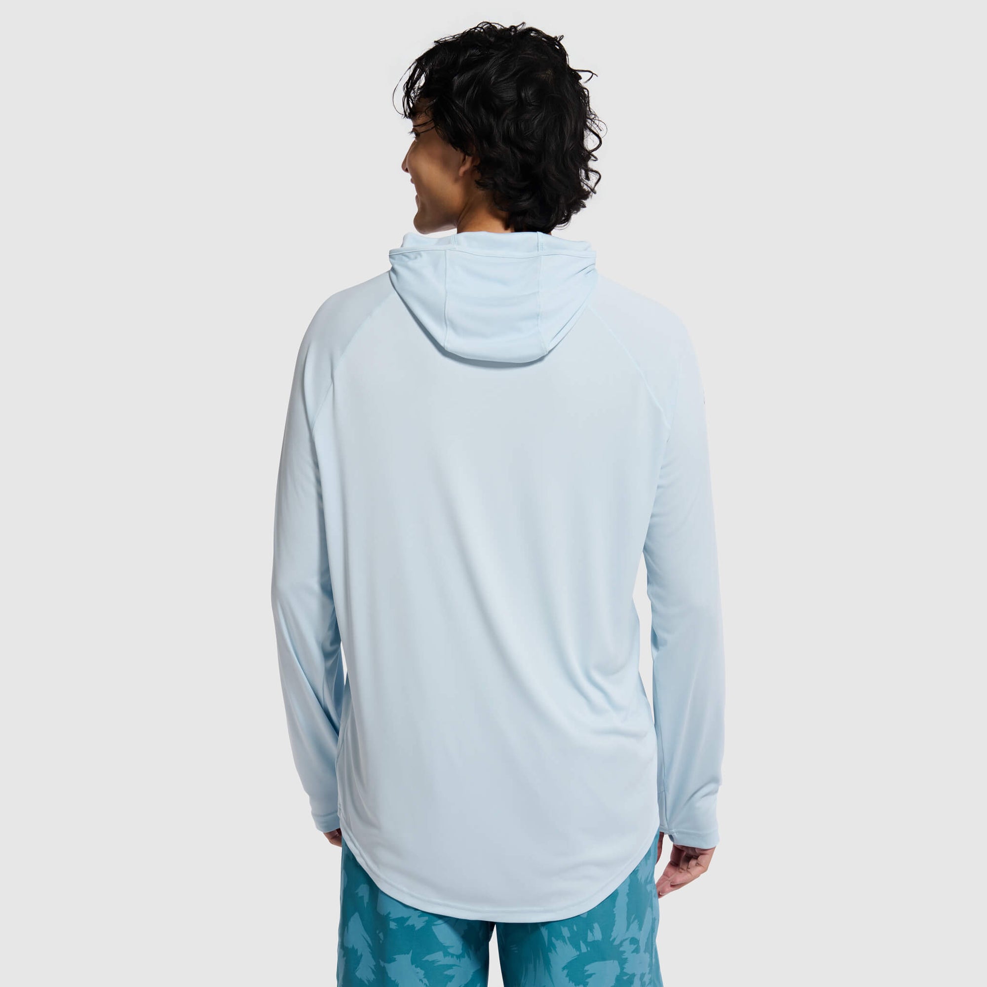 Light blue hooded long-sleeve shirt shown from back view on male model