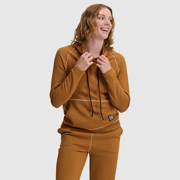 Women's waffle-knit pullover hoodie with drawstring hood and contrast piping, front on-model view
