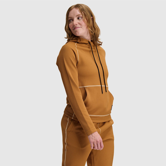 Women's waffle-knit pullover hoodie with drawstring, contrast seams, angled three-quarter view