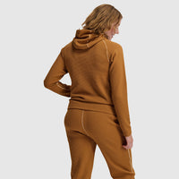 Women's waffle-knit hoodie back view with matching jogger pants and contrast seam detailing
