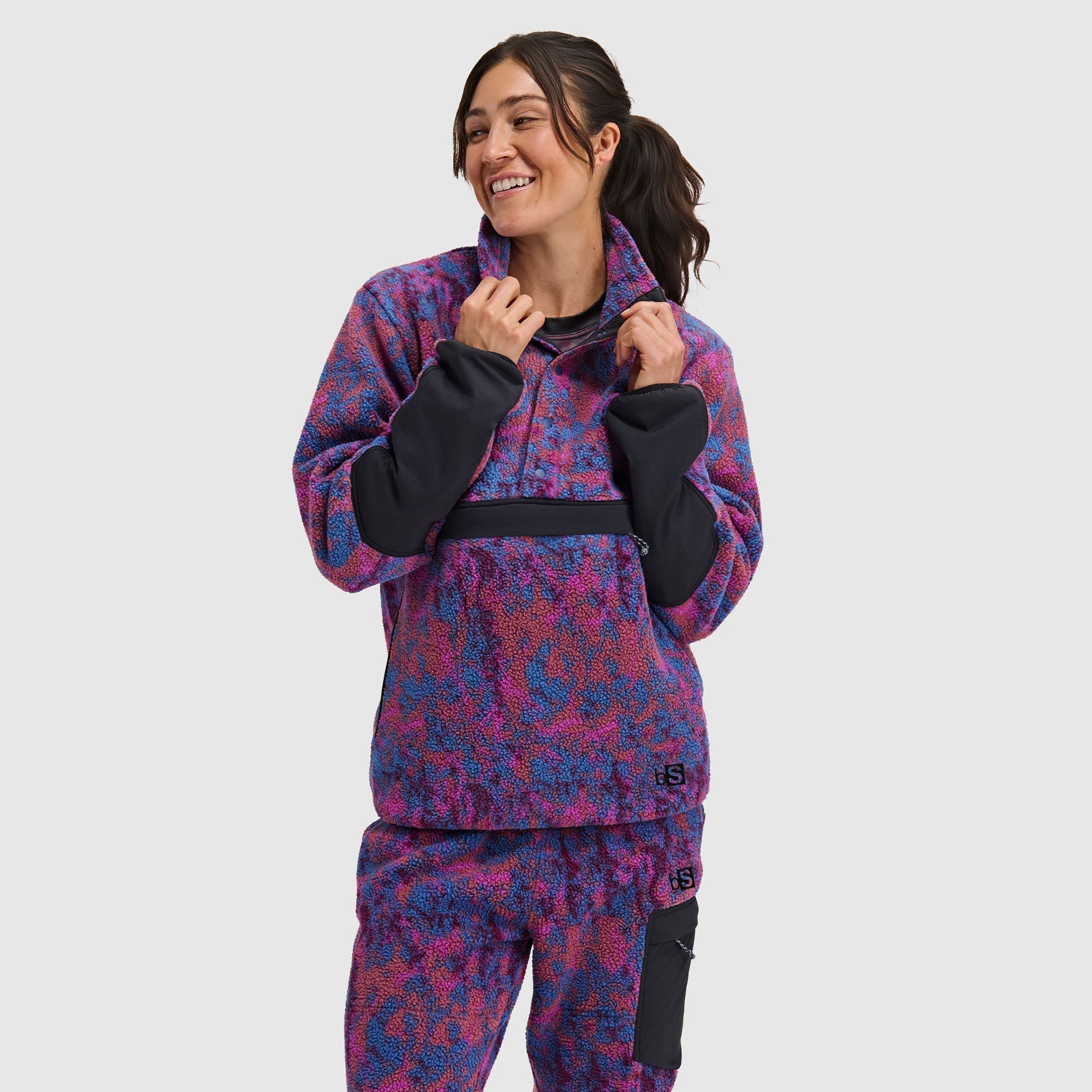 Purple and blue patterned fleece pullover with half snap closure and kangaroo pocket