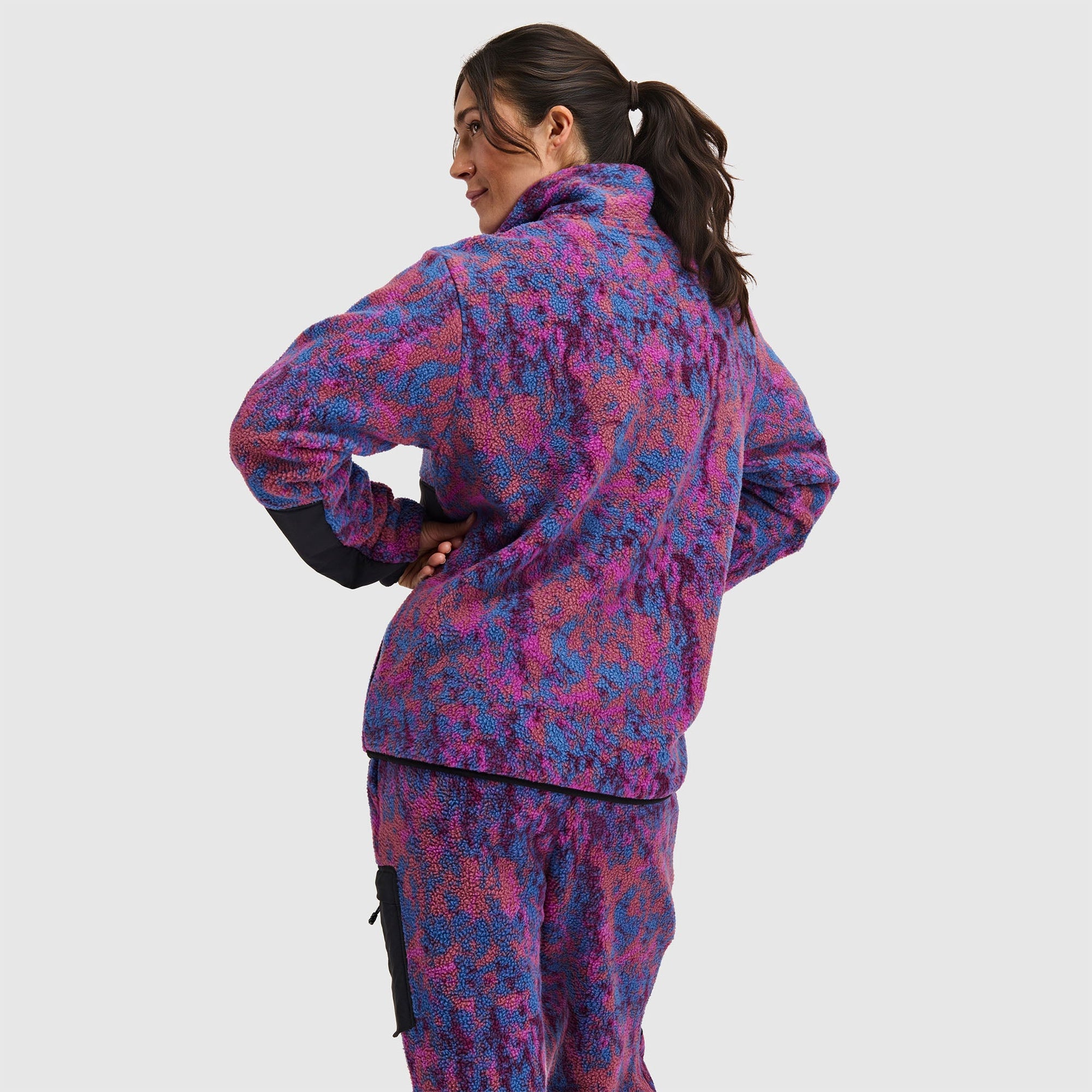 Purple and blue patterned fleece pullover with half snap closure, back view