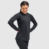 Women's long-sleeve crewneck base layer top, front on-model view, hands on hips