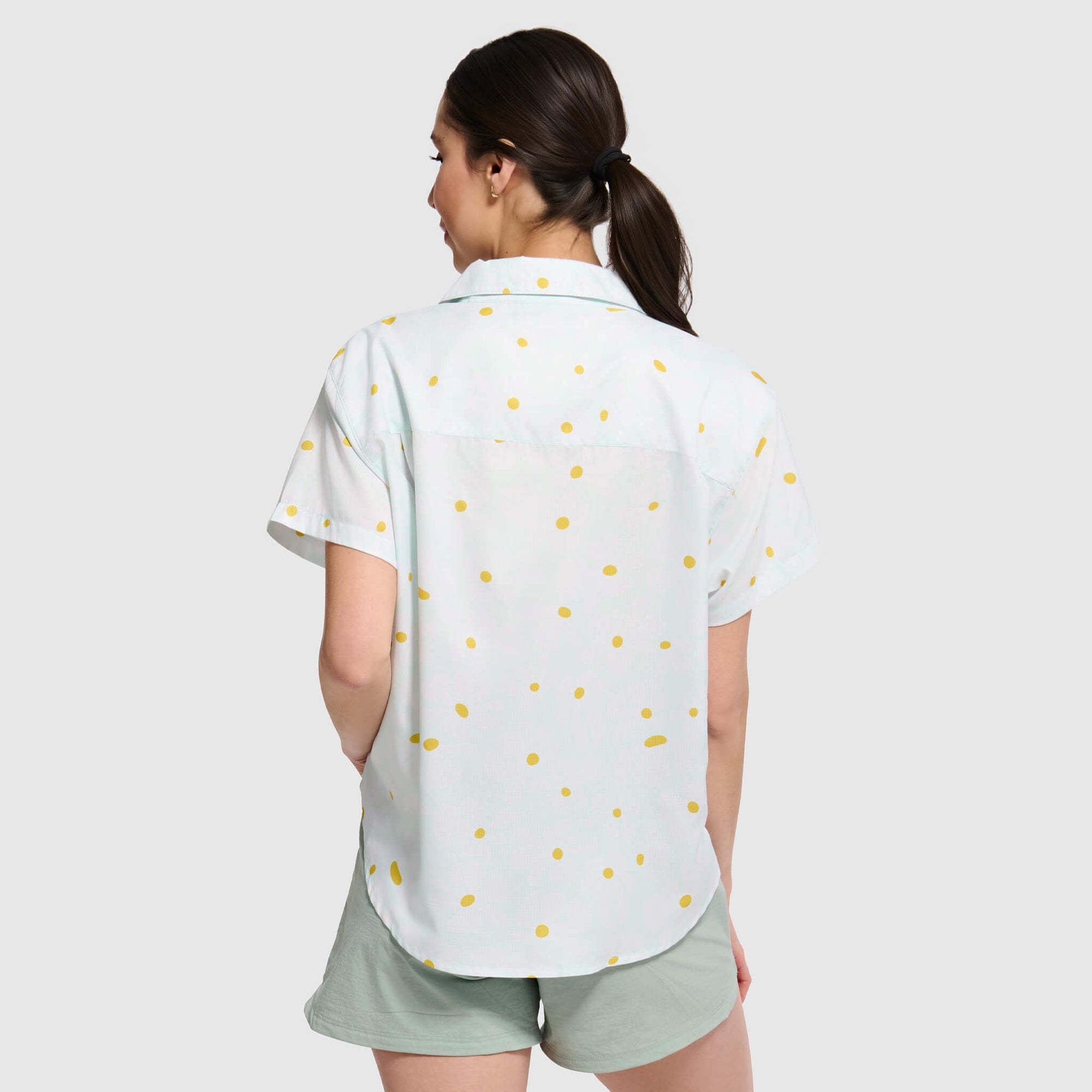 Light blue camp shirt with yellow polka dot pattern, back view showing relaxed fit