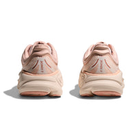 Light pink athletic running shoes shown from rear view with chunky sole design