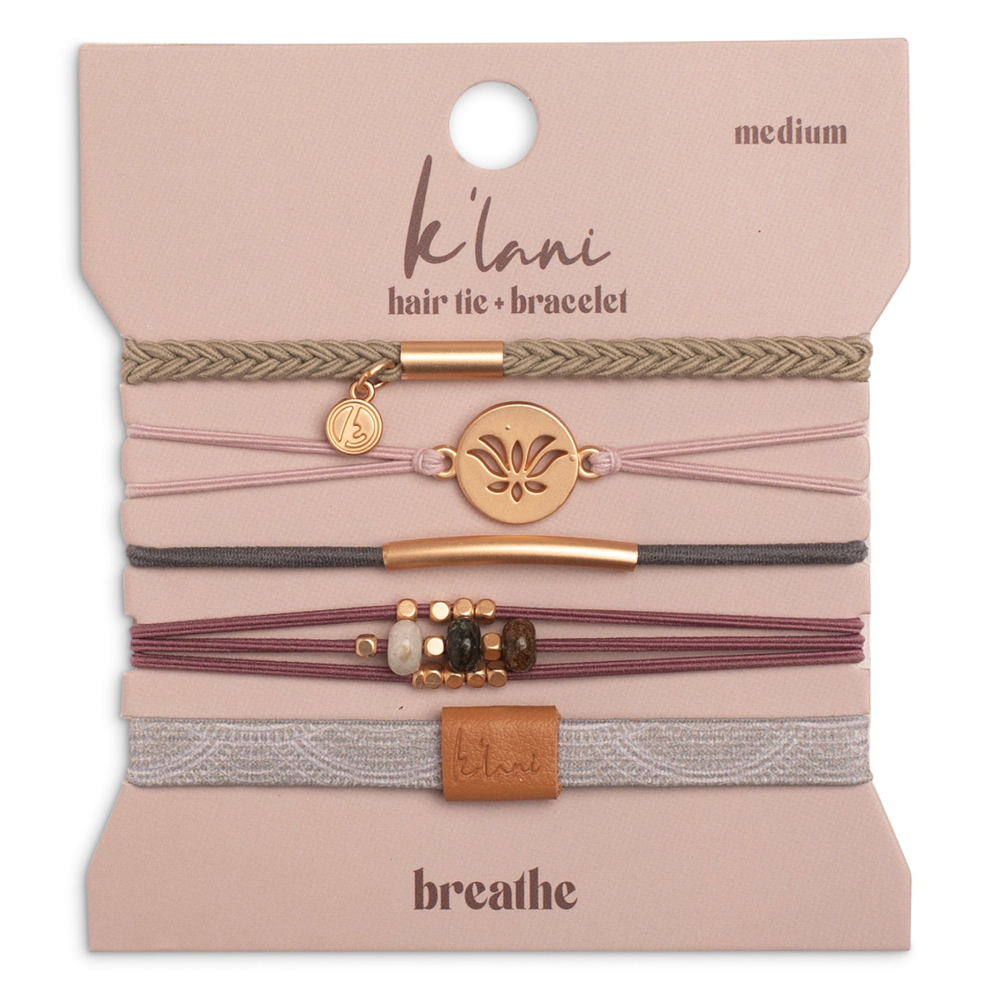 Set of five hair tie bracelets with lotus charm, beads, and leather tab on packaging card