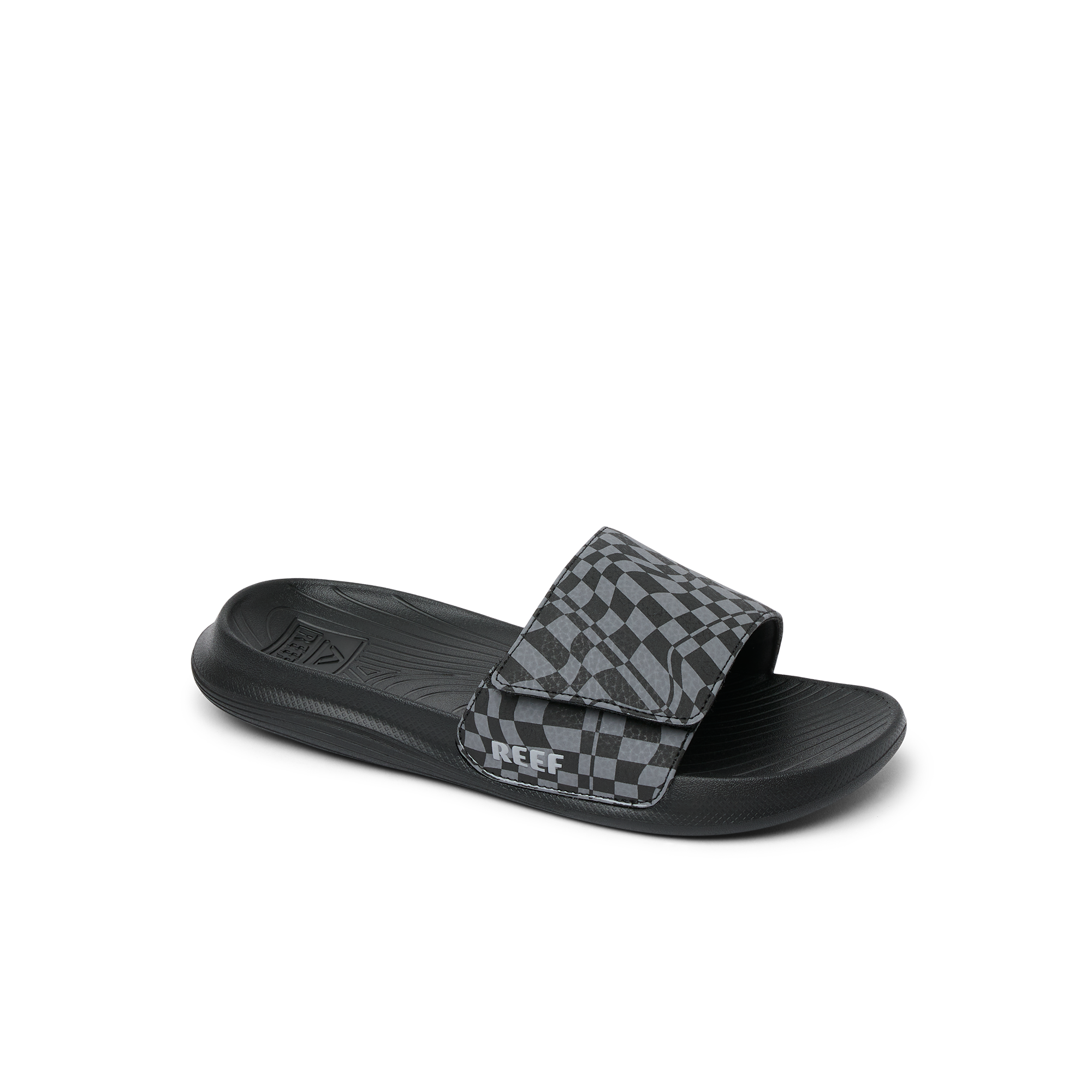 Black slide sandal with checkered pattern strap, side angle view on white background