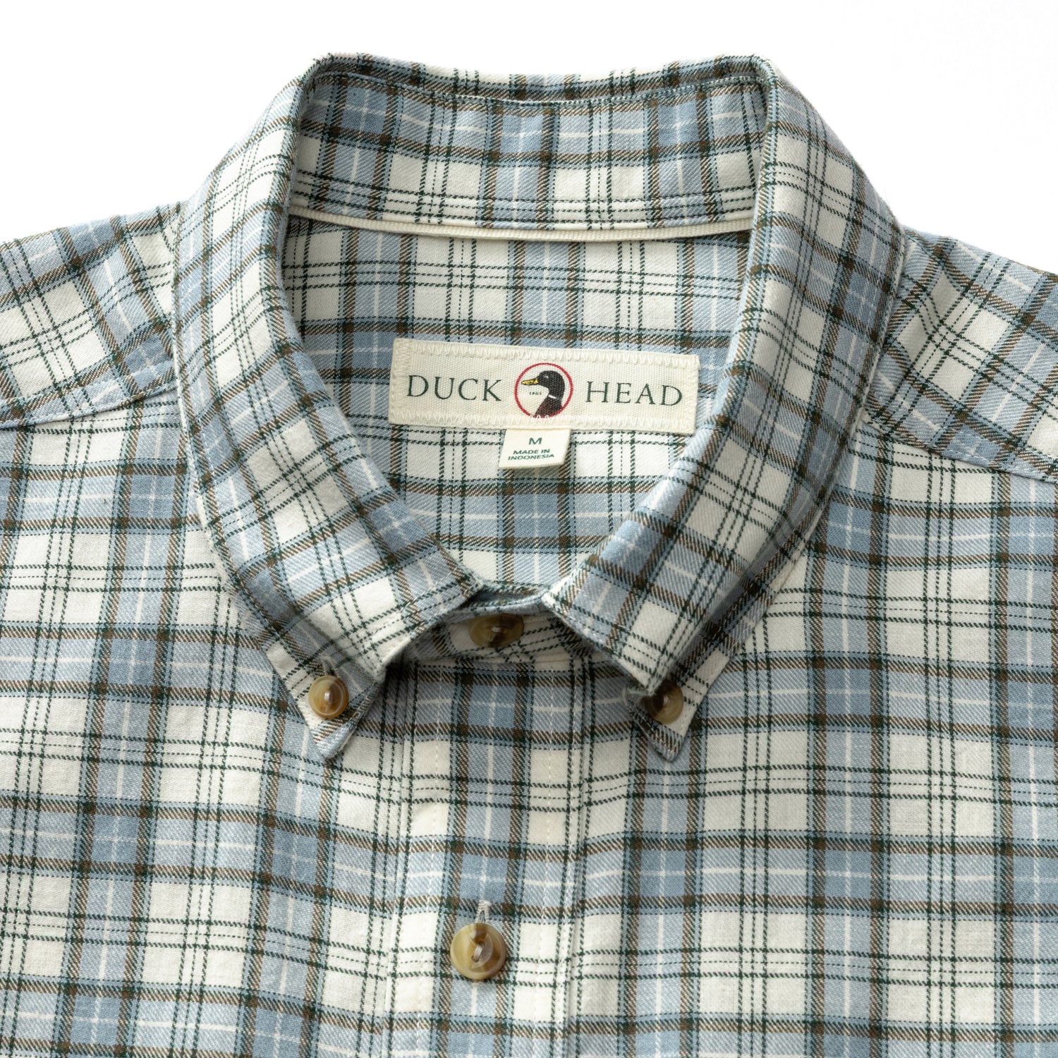 Men's plaid button-down sport shirt with button-down collar, close-up flat lay view showing label