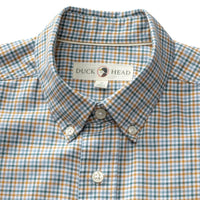 Men's button-down collar plaid sport shirt with amber, teal, and blue checks, flat lay view