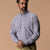 Men's long sleeve plaid button-down shirt with chest pocket, front view on model