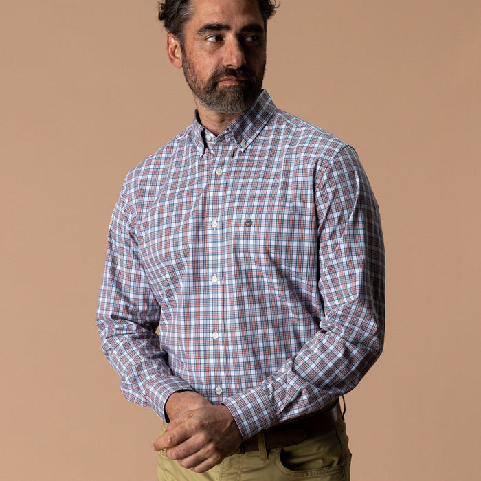 Men's long sleeve plaid button-down shirt with chest pocket, front view on model