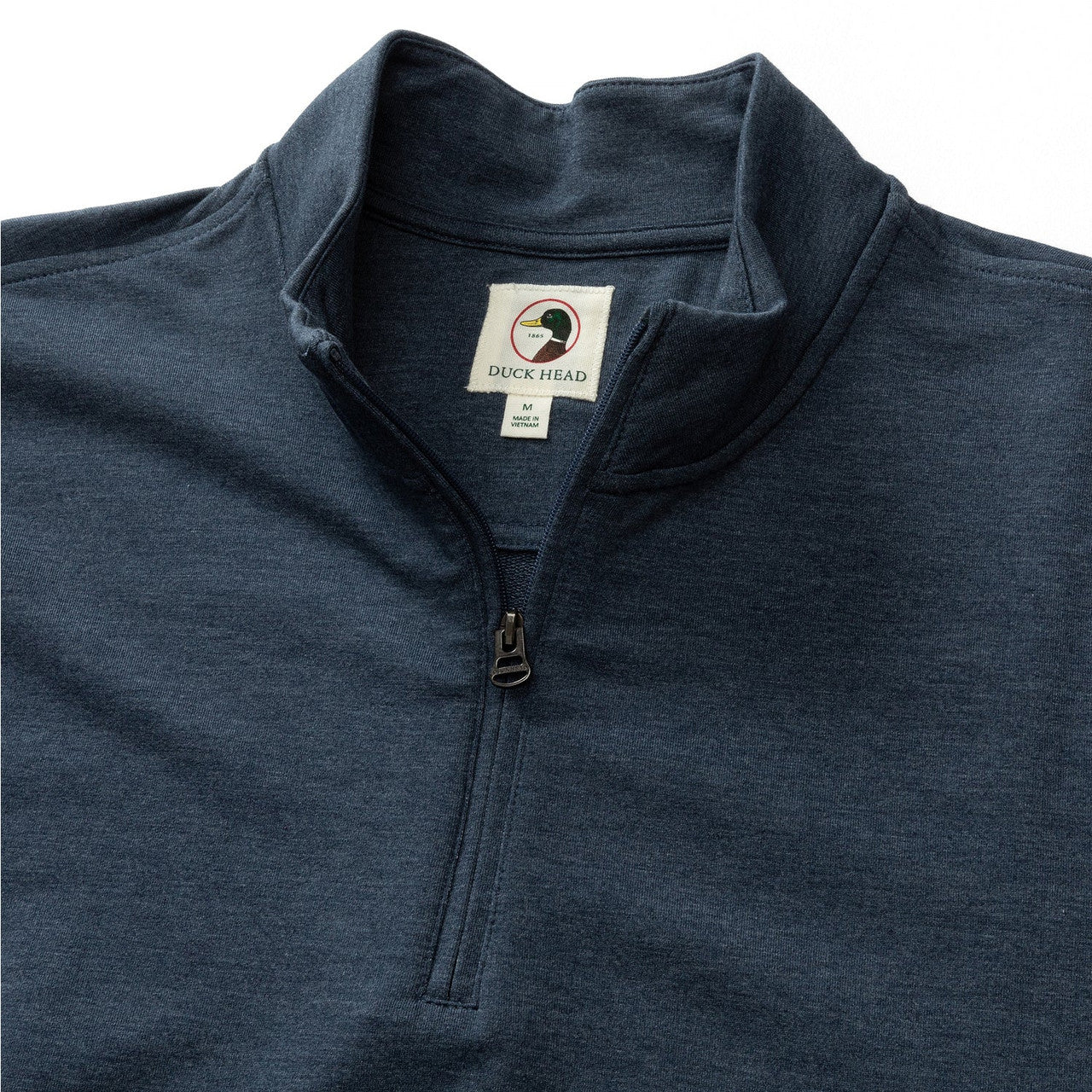 Dark blue quarter-zip pullover with stand collar showing neck and chest area detail