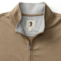 Tan quarter-zip pullover with collar detail showing brand label and zipper