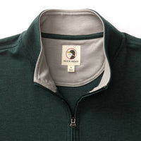 Dark green quarter-zip pullover with gray interior collar, detail close-up showing brand label