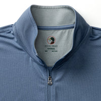 Men's quarter-zip pullover in blue with performance fabric, collar detail shown
