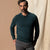 Men's long-sleeve merino polo sweater in deep teal, buttoned collar, worn on model, front view