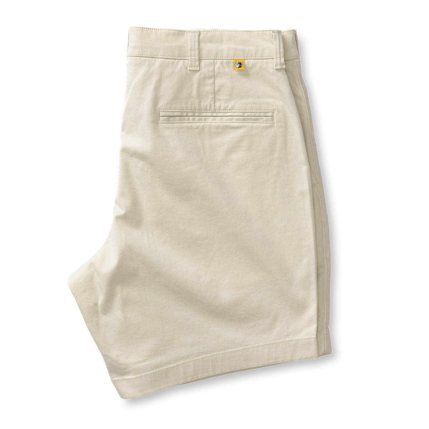 Light beige chino shorts with gold button detail and back pocket, folded flat view