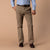 Men's classic fit tan chino pants with brown leather belt, front on-model view