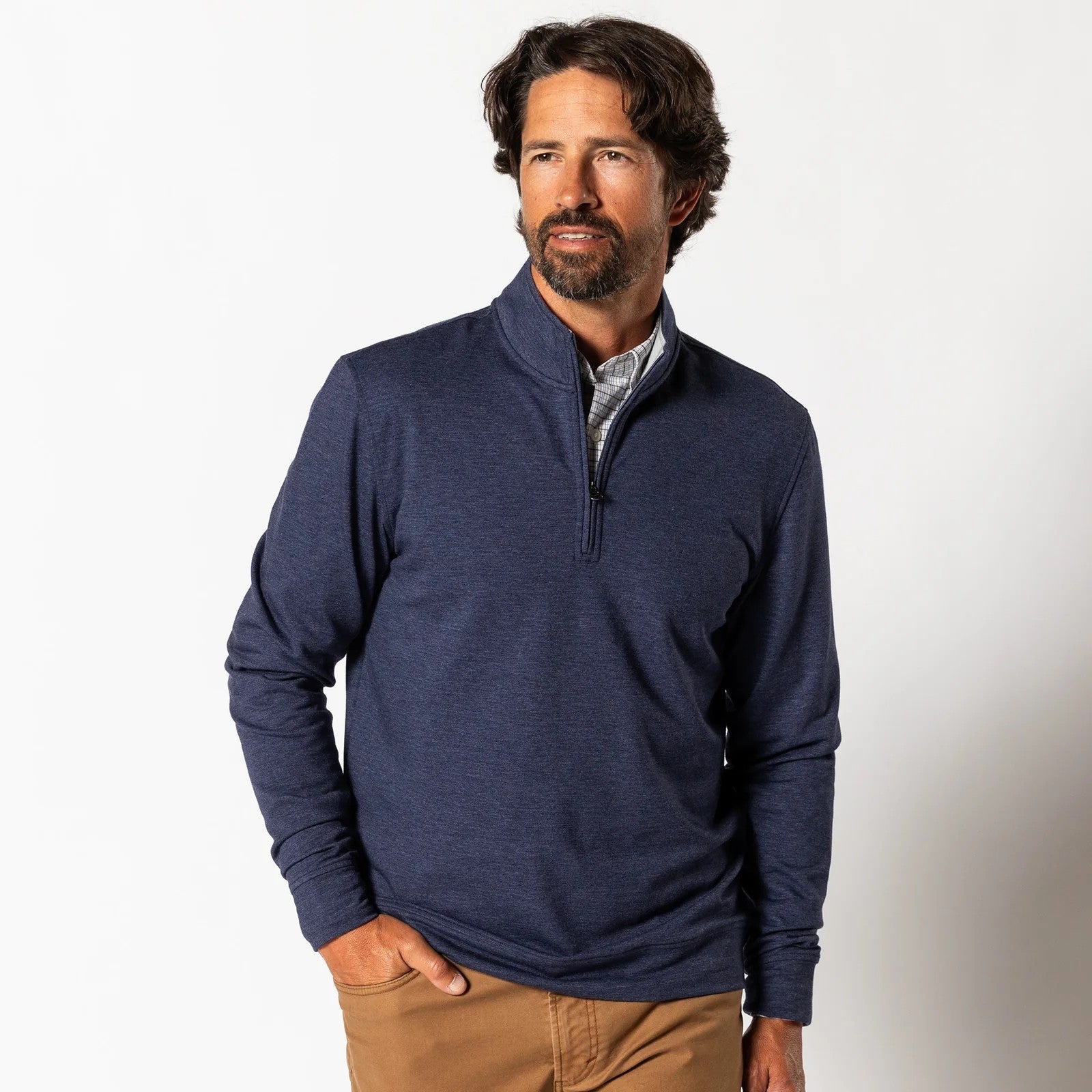 Navy heathered quarter-zip pullover with long sleeves worn by man in studio photo