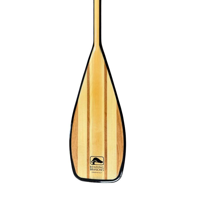 Wooden canoe paddle blade with vertical wood grain stripes on white background