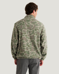 Men's camo fleece half-zip pullover, back view, showing camouflage pattern and ribbed cuffs