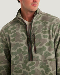 Men's camo fleece half-zip pullover with chest pocket and rope zipper pulls, close-up detail view