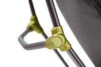 Close-up of reclining chair frame joint with yellow-green aluminum connector and grey poles