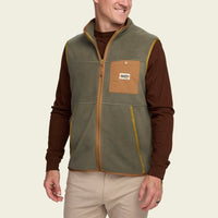 Men's fleece vest with full zip, chest snap pocket, and contrast trim, front view on model