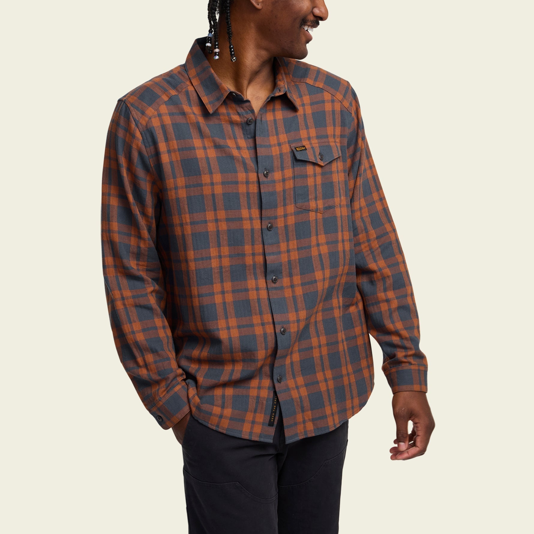 Men's long-sleeve plaid flannel shirt in gray and rust, button-front with chest pocket, front view