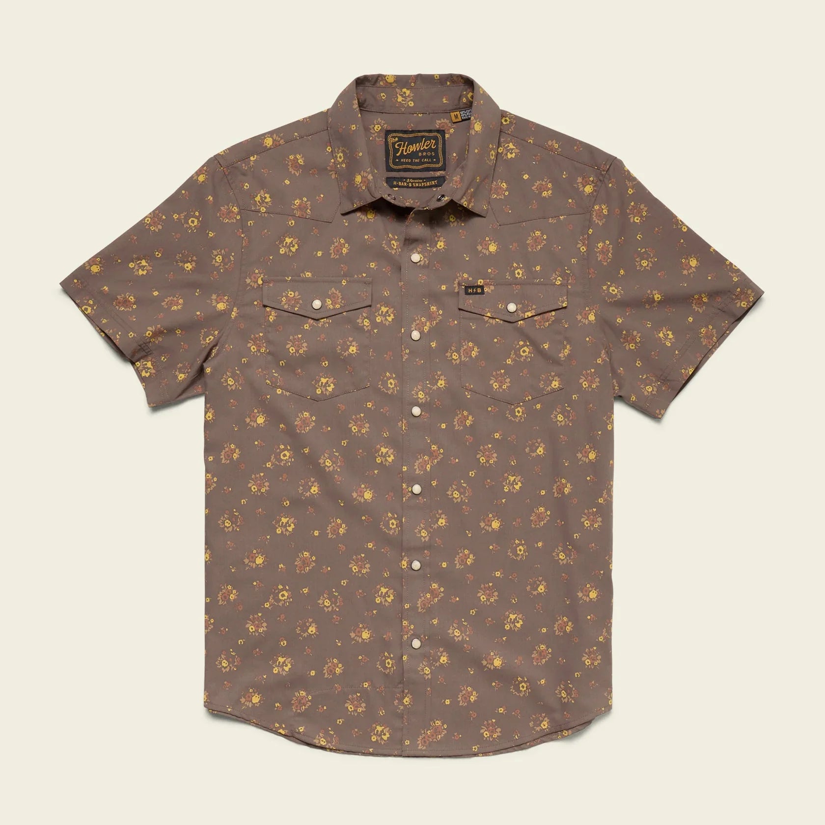 Men's short-sleeve western snap shirt in brown floral print, flat lay front view with two chest pockets