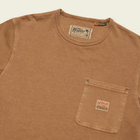 Tan cotton crew-neck t-shirt with chest pocket and woven logo patch, angled view