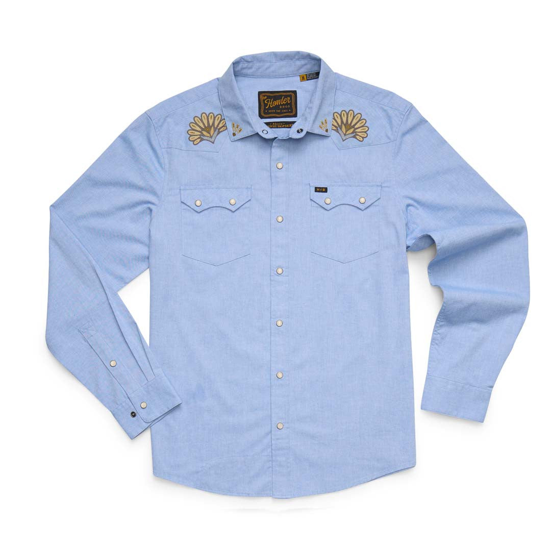 Light blue western long-sleeve shirt with snap buttons, dual chest pockets, and floral shoulder embroidery