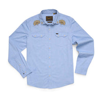 Light blue western long-sleeve shirt with snap buttons, dual chest pockets, and floral shoulder embroidery