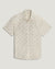 Light colored short sleeve button-up shirt with shell pattern print, front view