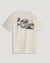 Light colored t-shirt with adventure van and palm tree graphic on back