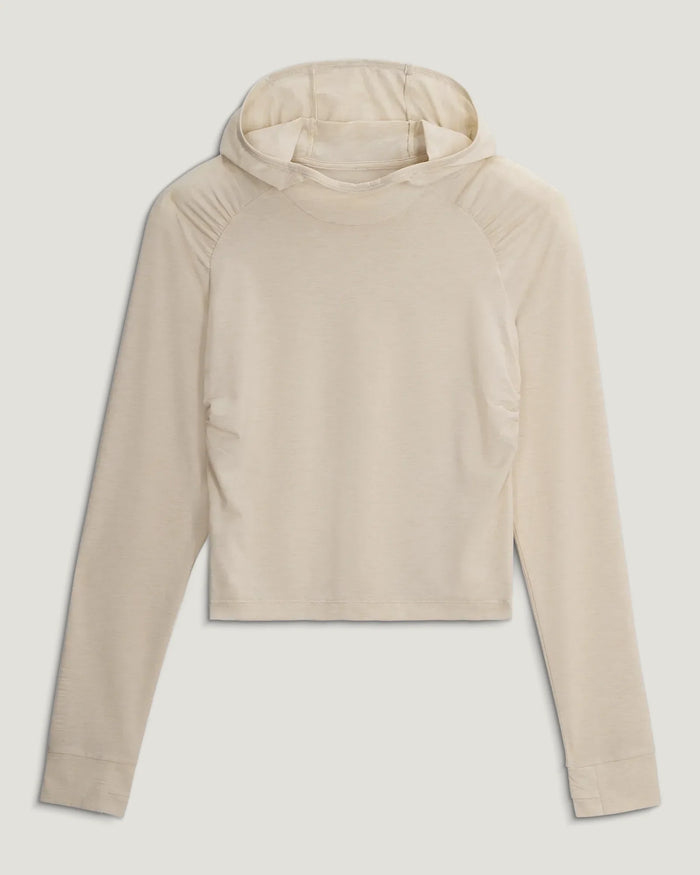 Light colored lightweight pullover hoodie with long sleeves on clean white background
