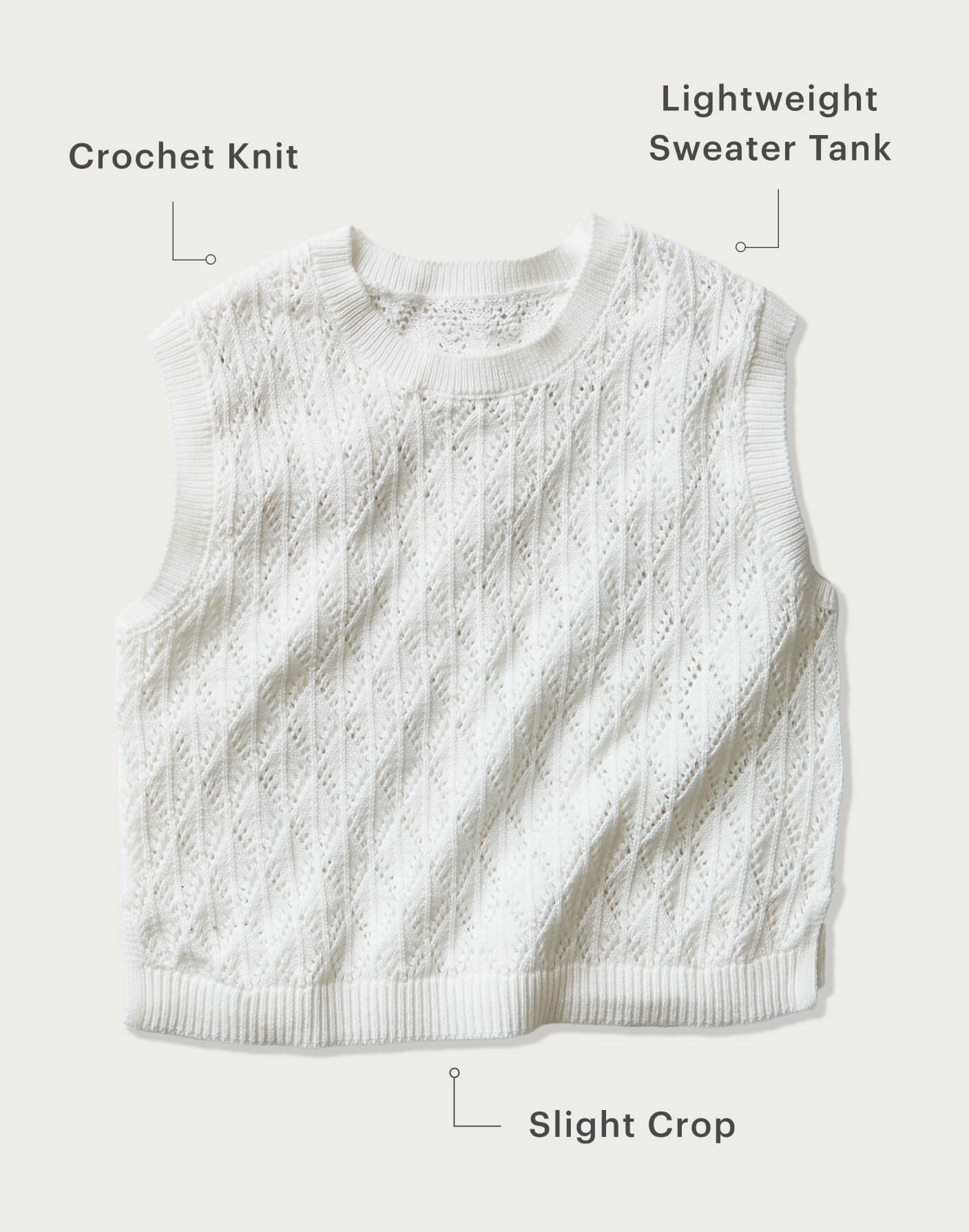 White crochet knit sleeveless sweater tank with slight crop and ribbed trim, flat lay view