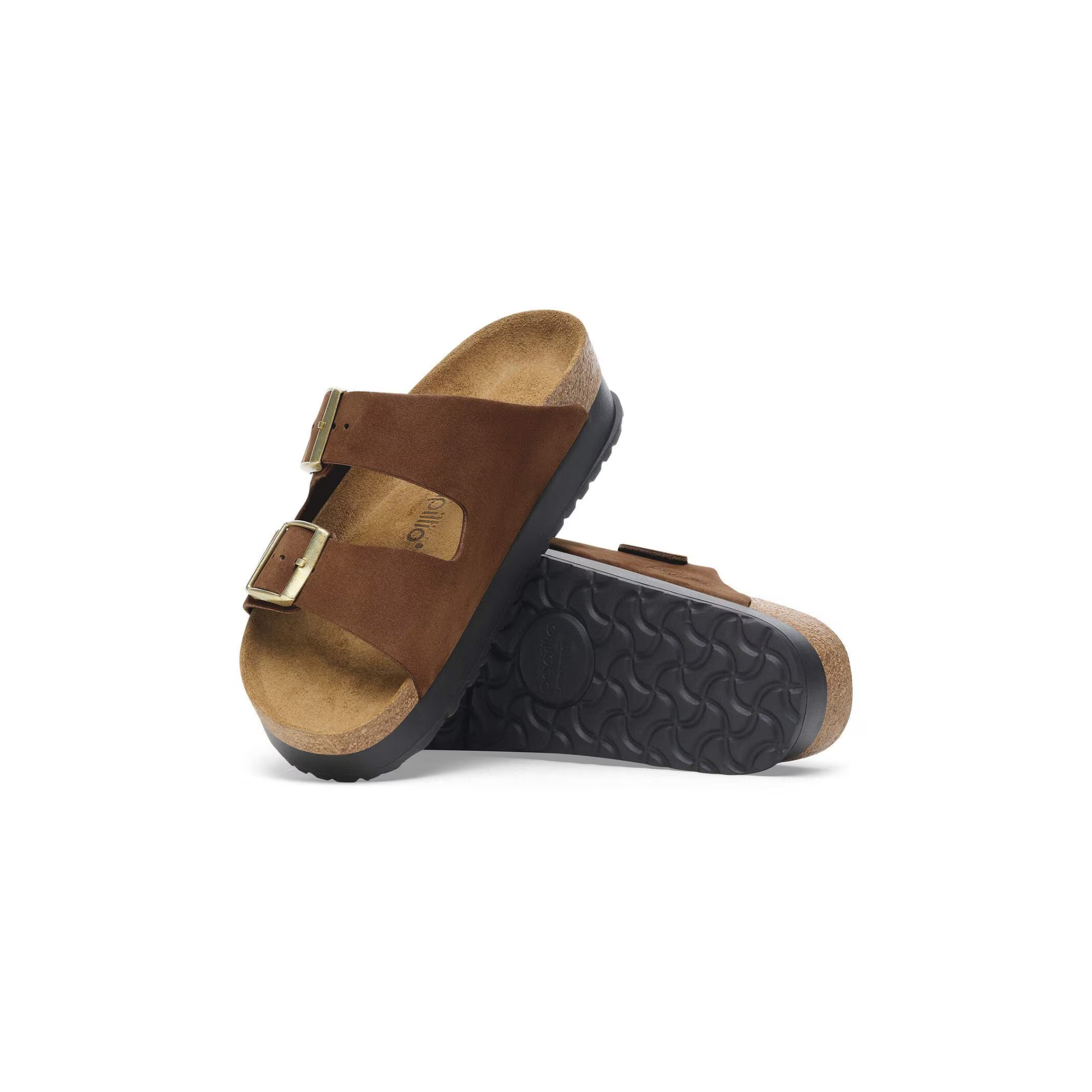 Brown leather platform sandals with double buckle straps and cork footbed, side view