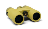 Compact yellow binoculars with textured rubber grip and dark lenses, angled front view