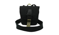 Small black canvas field pouch with buckle closure, shoulder strap, and olive accent details, front view