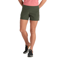 Olive green athletic shorts with elastic waistband, worn with coral top and sneakers