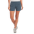 Women's athletic shorts in blue-gray color, worn with sneakers on white background
